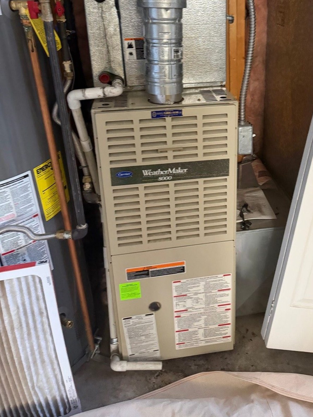 Carrier WeatherMaker gas furnace in a Utah utility closet