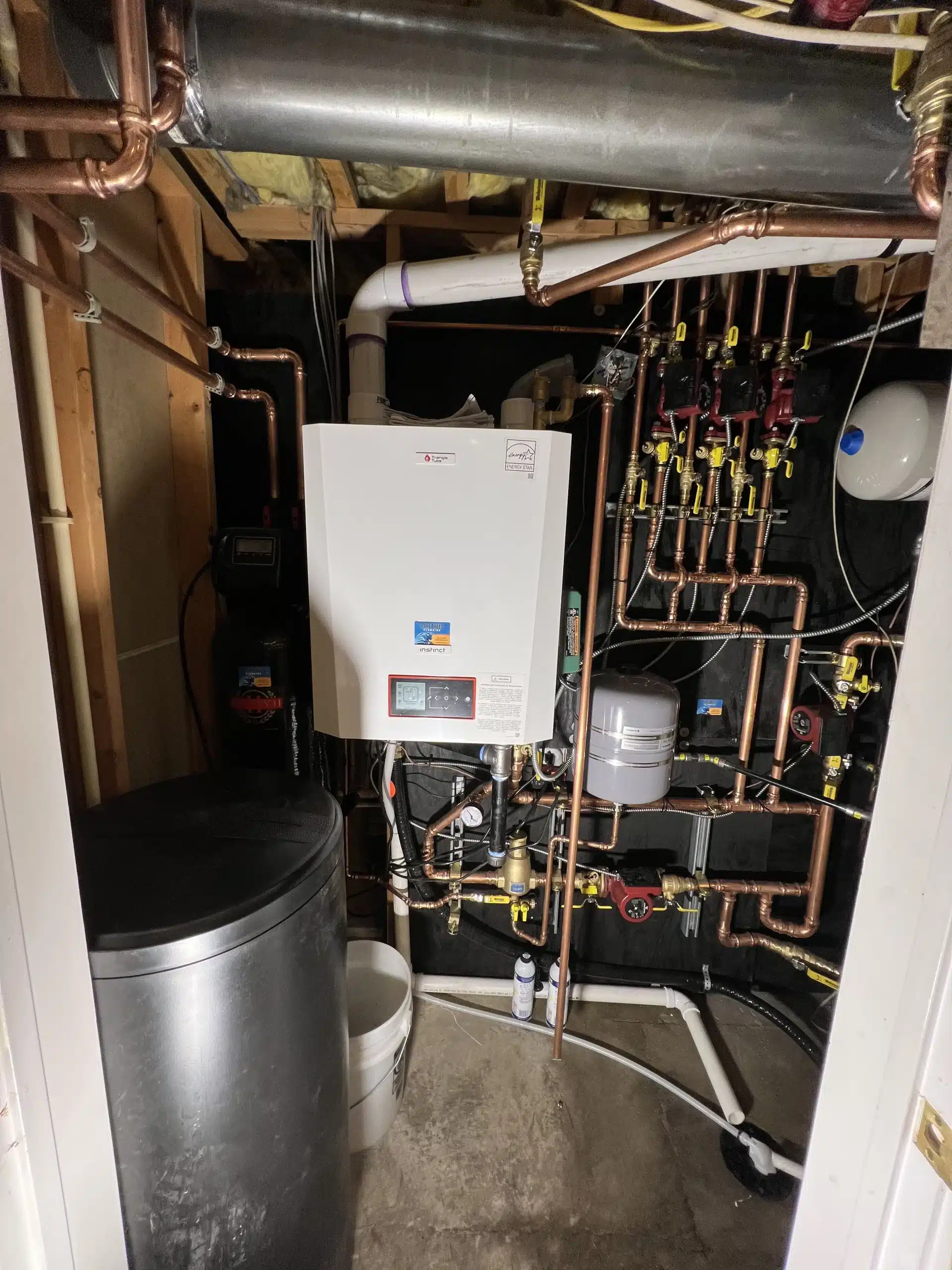 Rare Breed Navien system with copper manifold and water softener